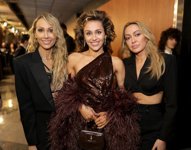 Tish Cyrus, Miley Cyrus and Brandi Cyrus attend the 66th Grammy Awards on Feb. 4 in Los Angeles.