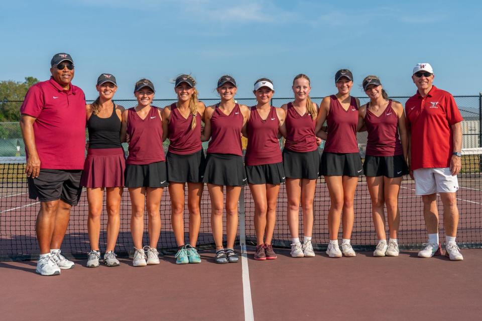 The Niceville girls tennis team poses after their region championship win over Chiles at Eagle Ram Tennis Center.