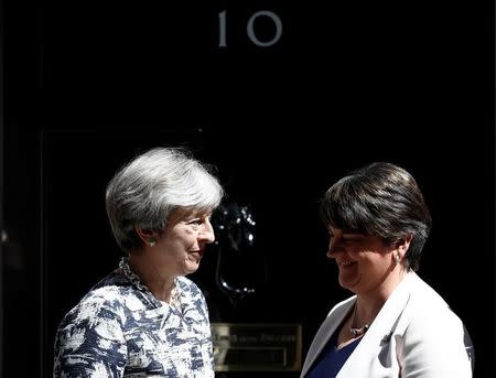 Britain's Prime Minister, Theresa May, speaks with Democratic Unionist Party (DUP) Leader Arlene Foster, outside 10 Downing Street, in central London, Britain June 26, 2017. REUTERS/Stefan Wermuth