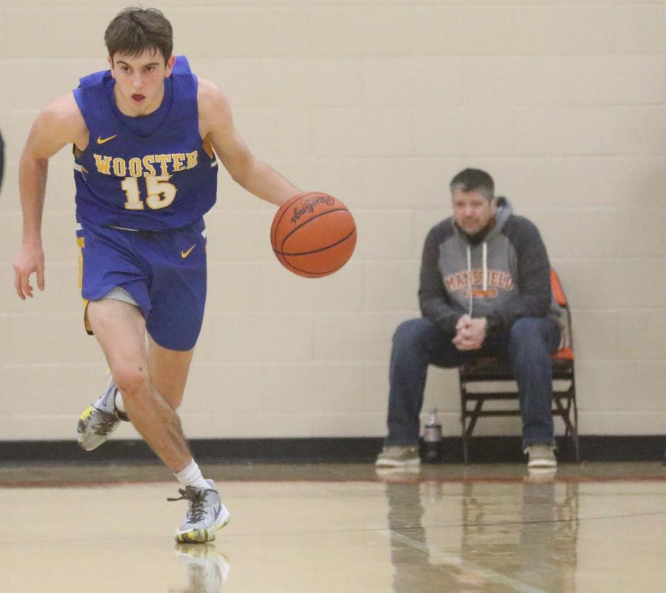 Wooster's Drew Dossi scored a team-high 14 points in a loss to Mansfield Senior on Friday night.