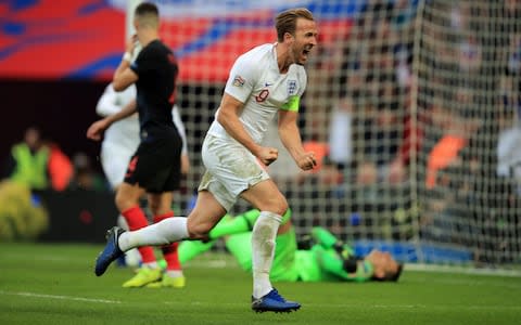 Harry Kane of England celebrates scoring the winning goal during the UEFA Nations League A group four match between England and Croatia - Credit: GETTY IMAGES