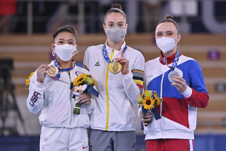 USA’s Sunisa Lee, Belgian gymnast Nina Derwael and ROC’s Anastasia Ilyankova pose for the photographer on the podium after the individual uneven bars final event in the artistic gymnastics competition, on the 10th day of the “Tokyo 2020 Olympic Games” in Tokyo. (Photo by DIRK WAEM/Belga/Sipa USA)(Sipa via AP Images) - Credit: Sipa USA via AP