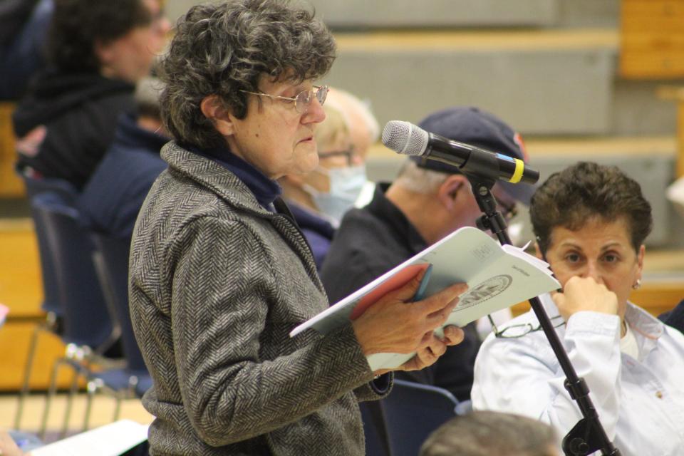 Phyllis Sprout, a Mashpee resident, hoped to amend Article 36 to eliminate vernal pools from the buffer zone description. Voters decided not to amend Article 36, and the motion carried after a card count.