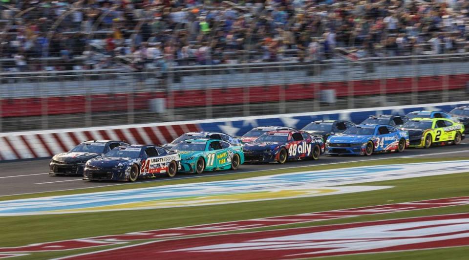 Leaders resume the race after a caution during the Coca-Cola 600 at Charlotte Motor Speedway in Concord on Sunday, May 26, 2024.