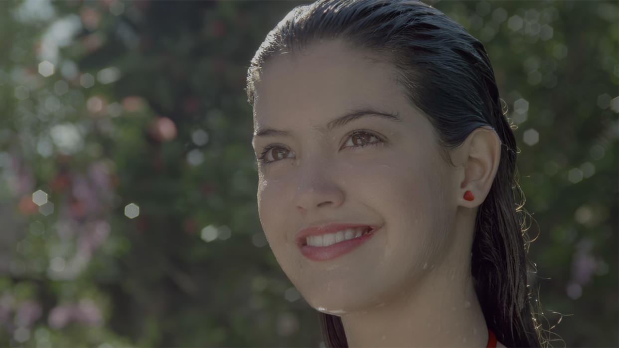  Phoebe Cates gets out of the pool in red bikini in Fast Times at Ridgemont High. 