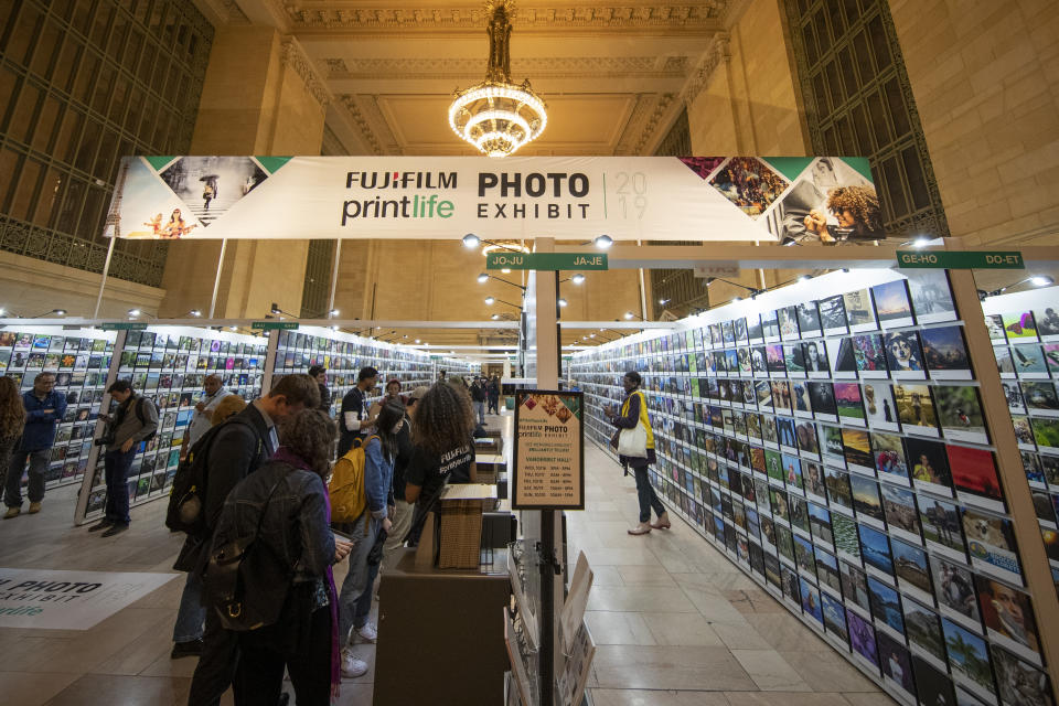 Rows and rows of wonderful photos taken by shutterbugs nationwide in Vanderbilt Hall. (Photo: Gordon Donovan/Yahoo News)