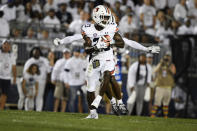 Auburn cornerback Roger McCreary (23) intercepts a pass intended for Penn State wide receiver KeAndre Lambert-Smith during the first half of an NCAA college football game in State College, Pa., on Saturday, Sept. 18, 2021. (AP Photo/Barry Reeger)