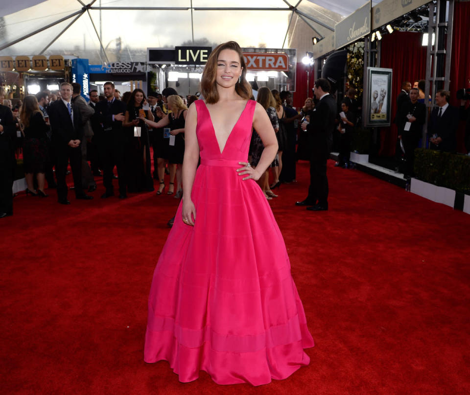 Emilia Clarke in a highlighter pink dress by Dior Haute Couture at the 22nd Annual Screen Actors Guild Awards at The Shrine Auditorium on January 30, 2016 in Los Angeles, California.