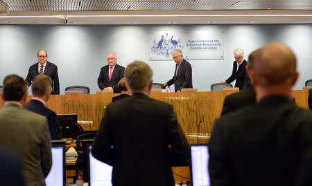 Officials from the Royal Commission into Institutional Responses to Child Sexual Abuse arrive on the opening day of their public hearing into the Anglican Church of Australia in Sydney, Australia, March, 17 2017. Royal Commission into Institutional Responses to Child Sexual Abuse/Jeremy Piper/Handout via REUTERS