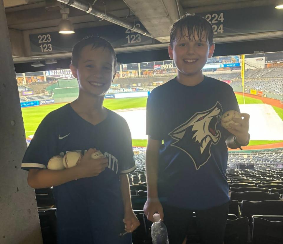 Owen Jurgensen, right, caught a Bobby Witt Jr. home run ball. His friend, Ford Lamb, left Kauffman Stadium with three baseballs.