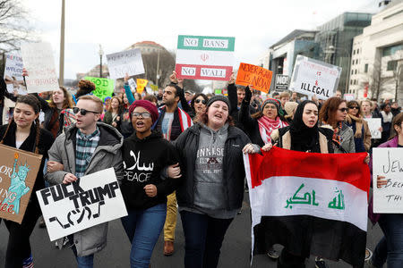 Activists march to the US Capitol to protest President Donald Trump's executive actions on immigration in Washington January 29, 2017. REUTERS/Aaron P. Bernstein TEMPLATE OUT