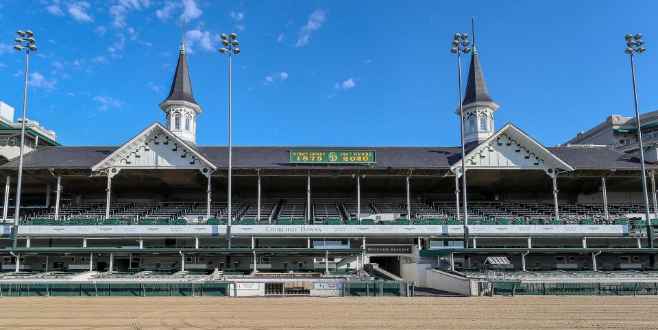 Churchill Downs racetrack sits empty on Saturday, May 2, 2020, in Louisville, Kentucky, on what would have been the 146th Running of The Kentucky Derby.  The race has been run 145 consecutive times but had to postpone until September 5, 2020, because of the coronavirus.