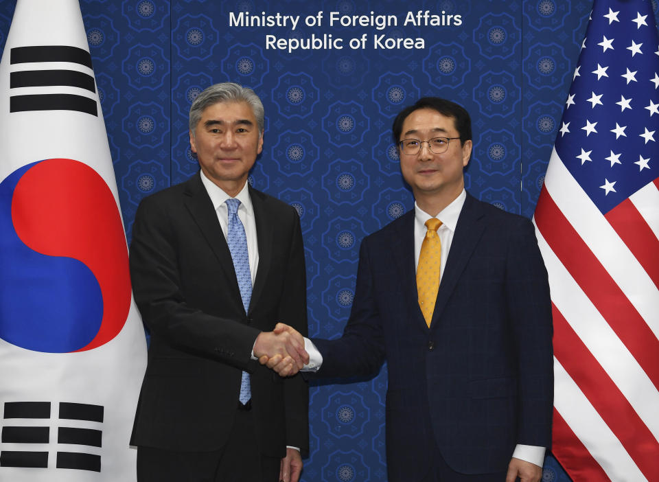 U.S. Special Representative for North Korea, Sung Kim, left, shakes hands with South Korea's Special Representative for Korean Peninsula Peace and Security Affairs Kim Gunn, prior to a meeting at the Foreign Ministry Thursday, April 6, 2023 in Seoul, South Korea. (Song Kyung-Seok/Pool Photo via AP)