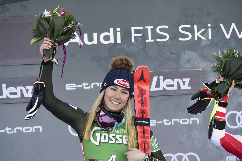 United States' Mikaela Shiffrin celebrates winning an alpine ski, women's World Cup giant slalom, in Lienz, Austria, Saturday, Dec. 28, 2019. (AP Photo/Piermarco Tacca)