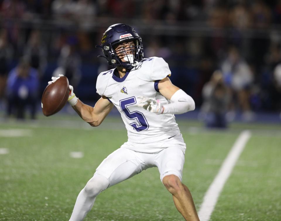 Victor's Adam Ruffalo ,acting as quarterback on the play, throws a touchdown pass.