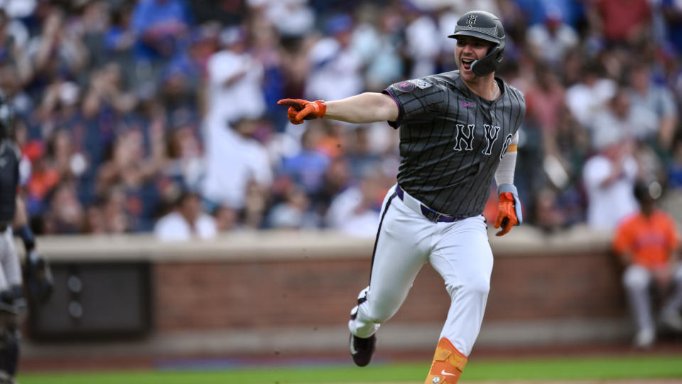 New York Mets first baseman Pete Alonso (20) reacts after a two RBI single against the Houston Astros during the second inning at Citi Field.