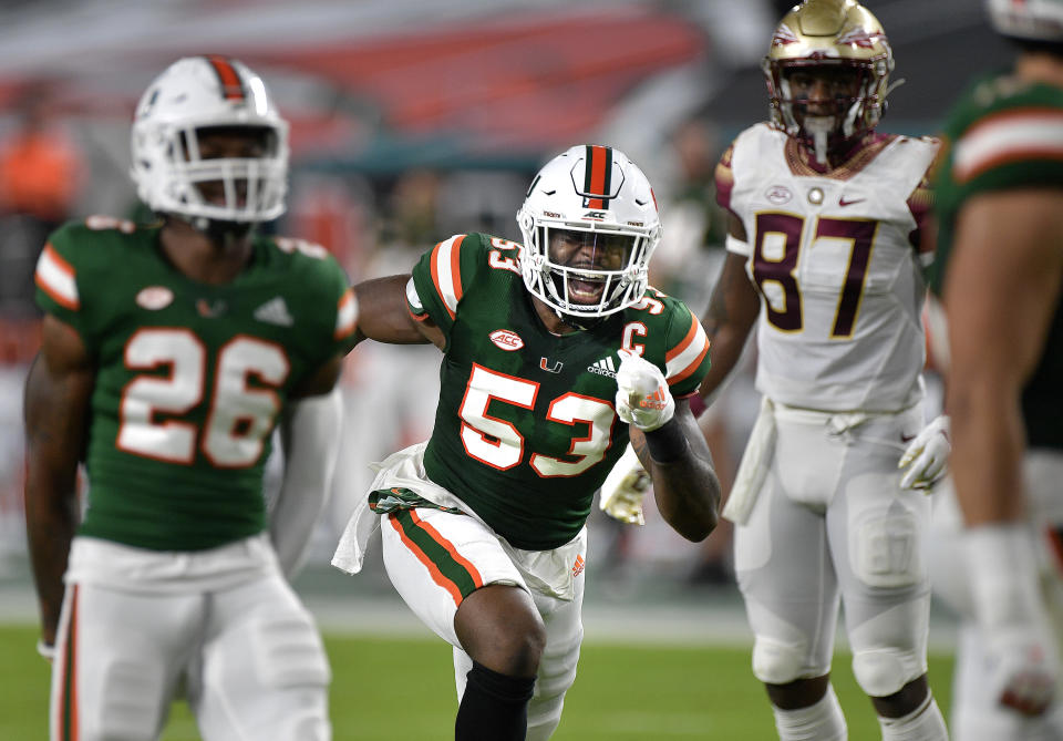 Miami linebacker Zach McCloud celebrates a play against Florida State during the first half of an NCAA college football game Saturday, Sept. 26, 2020, in Miami Gardens, Fla. (Michael Laughlin/South Florida Sun-Sentinel via AP)