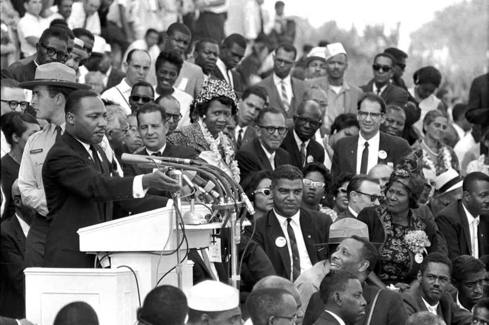 FILE - In this Aug. 28, 1963 file photo, the Rev. Dr. Martin Luther King Jr., head of the Southern Christian Leadership Conference, speaks to thousands during his "I Have a Dream" speech in front of the Lincoln Memorial for the March on Washington for Jobs and Freedom, in Washington. A new documentary “MLK/FBI,” shows how FBI director J. Edgar Hoover used the full force of his federal law enforcement agency to attack King and his progressive, nonviolent cause. That included wiretaps, blackmail and informers, trying to find dirt on King. (AP Photo/File)