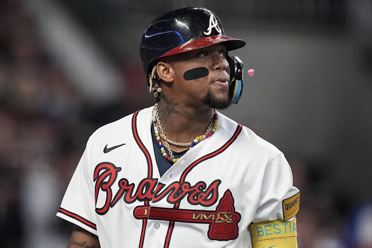 Atlanta Braves right fielder Ronald Acuna Jr. (13) walks back to the dugout after striking out against the Philadelphia Phillies during the fifth inning of Game 1 of a baseball NL Division Series, Saturday, Oct. 7, 2023, in Atlanta. (AP Photo/Brynn Anderson)