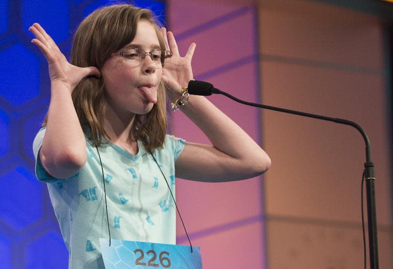 Audrey Frische of Soddy Daisy, Tennessee, makes a face after hearing her word, "obnebulate," during the 3rd round of the 88th Annual Scripps National Spelling Bee at National Harbor, Maryland, May 27, 2015