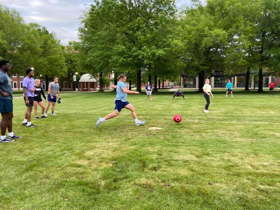 UAFS student prepares to kick a ball during the MOX kickball tournament.