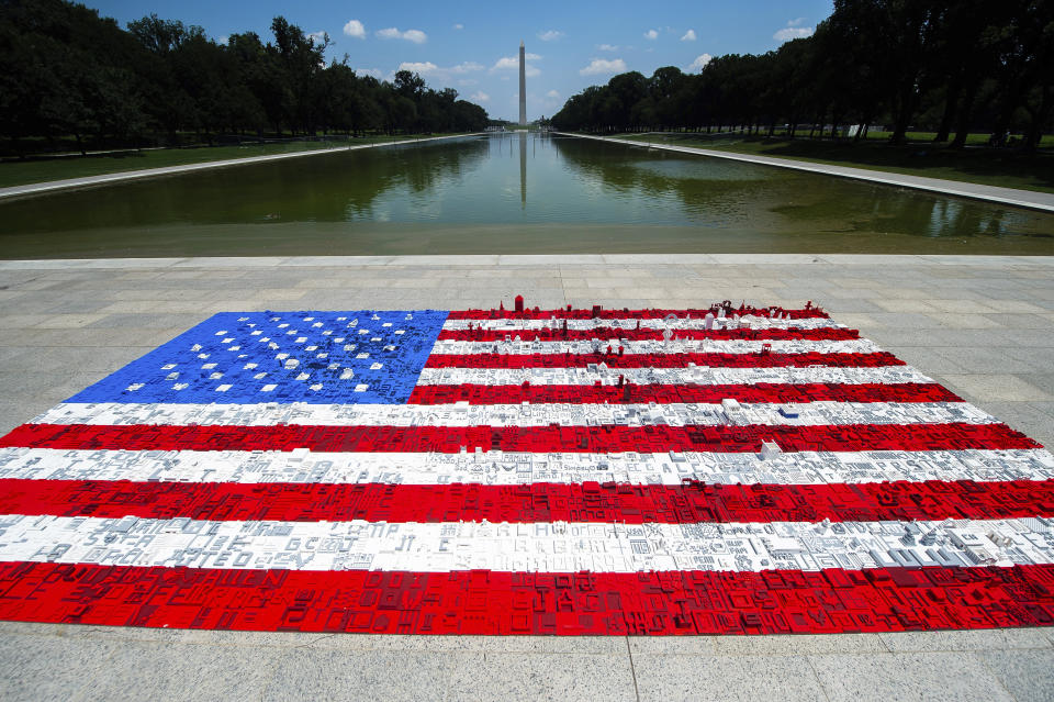 A 16 ft wide by 31 ft long LEGO® mural of an American flag, built by National Mall visitors is situated on the Lincoln Memorial plaza in support of The Trust for the National Mall event, Monday, July 2 in Washington (Joy Asico/AP Images for The LEGO Group)