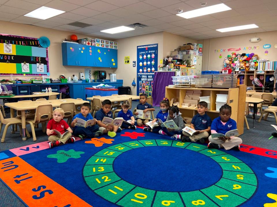 Pre-kindergarten students at Gocio Elementary take part in the "Bucket Fillers reading initiative under the direction of Embracing Our Differences.