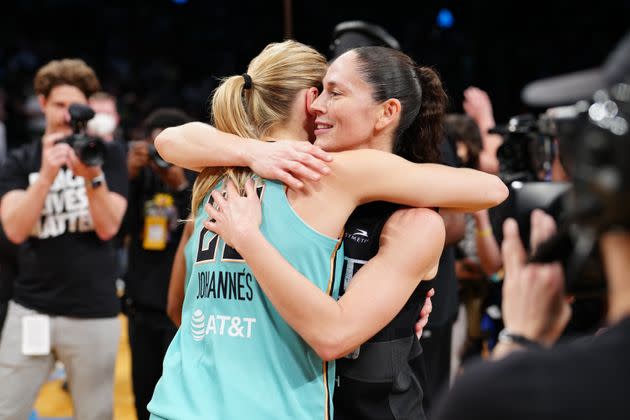 Marine Johannès of the New York Liberty hugs Sue Bird of the Seattle Storm after the game. (Photo: Evan Yu via Getty Images)