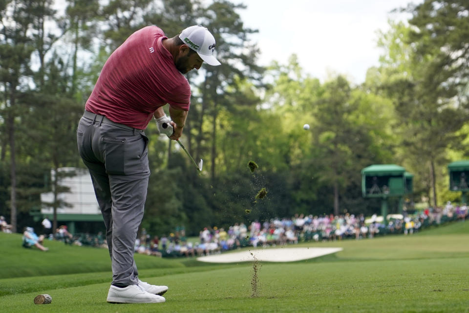 Jon Rahm, of Spain, hits his tee shot on the 16th hole during the final round of the Masters golf tournament on Sunday, April 11, 2021, in Augusta, Ga. (AP Photo/David J. Phillip)