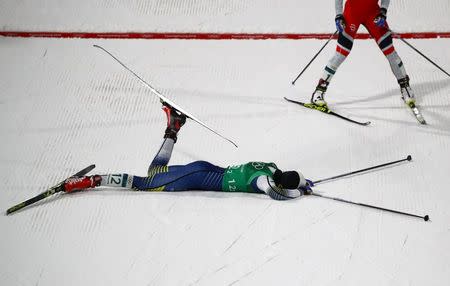 Cross-Country Skiing - Pyeongchang 2018 Winter Olympics - Women's Team Sprint Free Finals - Alpensia Cross-Country Skiing Centre - Pyeongchang, South Korea - February 21, 2018 - Jessica Diggins of the U.S. celebrates. REUTERS/Carlos Barria