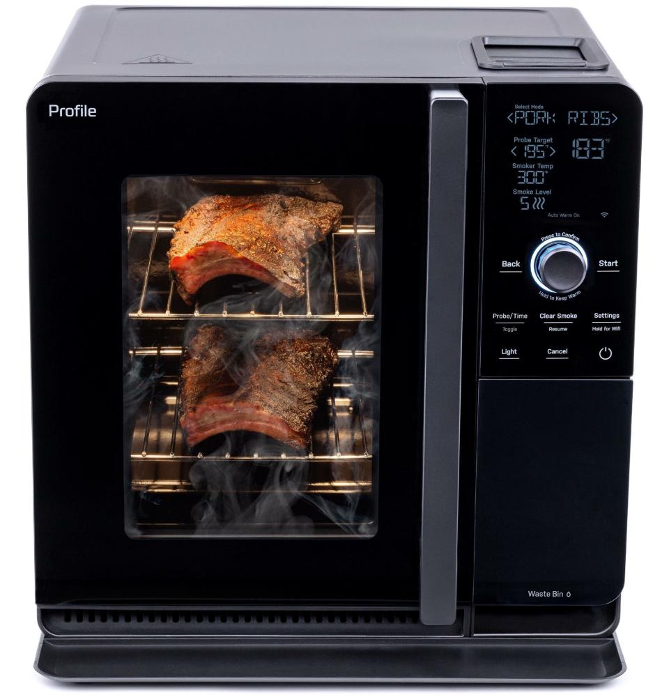The GE Profile Smart Indoor Smoker, which can hold a brisket, three racks of baby back ribs, a whole chicken, up to 40 chicken wings or a 14-pound pork butt, will be on display at the 2024 Consumer Electronics Show (CES) next week in Las Vegas.