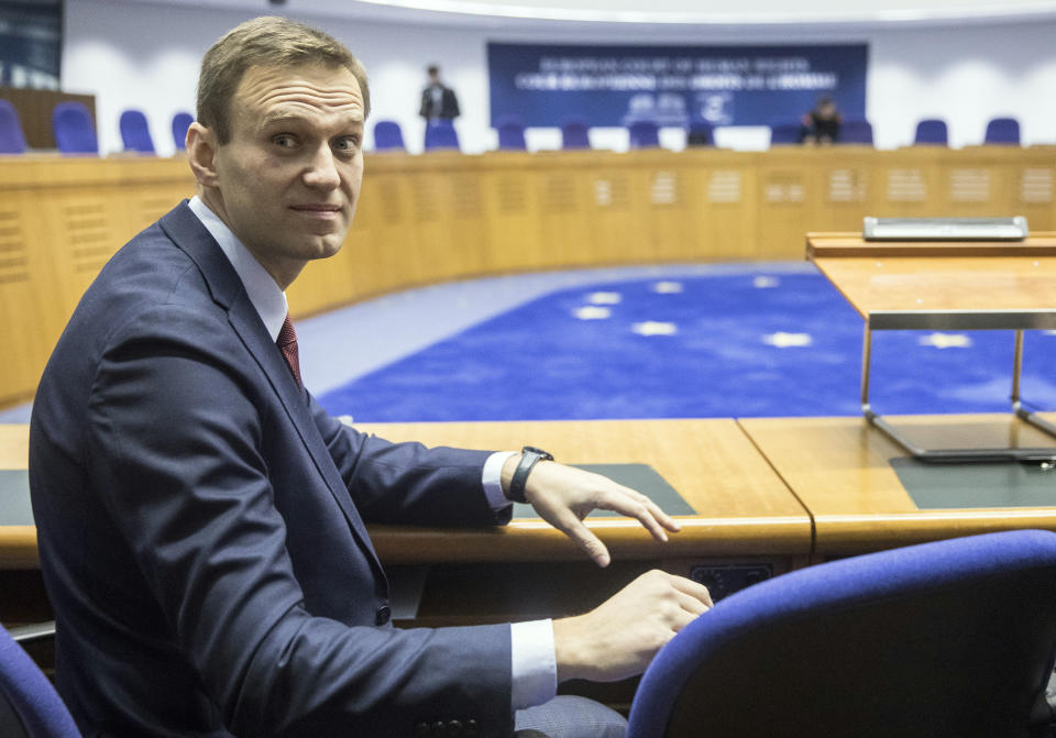 Russian opposition leader Alexei Navalny attends his hearing at the European Court of Human Rights in Strasbourg, eastern France, Thursday, Nov.15, 2018. The European Court of Human Rights has ruled that Russian authorities' repeated arrests of opposition leader Alexei Navalny were politically driven. (AP Photo/Jean-Francois Badias)