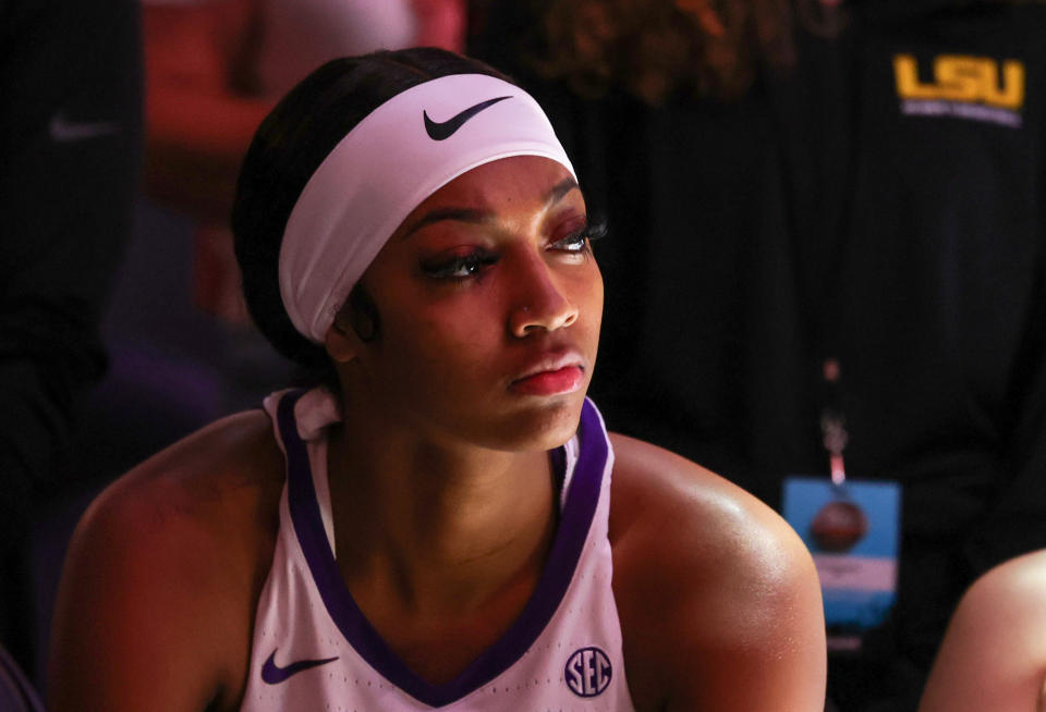 LSU's Angel Reese sits on the bench before the season opener. She has not played in the Tigers' previous two games. (Photo by Ethan Miller/Getty Images)