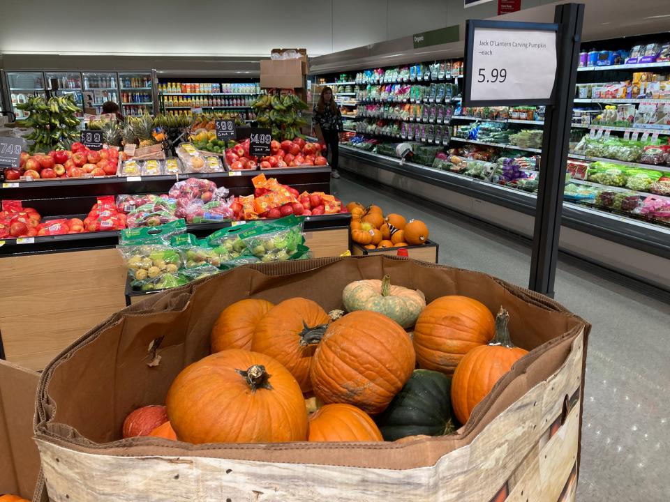 A bin of pumpkins for sale at Target.