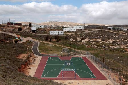 A basketball court is seen in the settler outpost of Amona near the Jewish settlement of Ofra, north of Ramallah March 1, 2011. REUTERS/Baz Ratner/File Photo