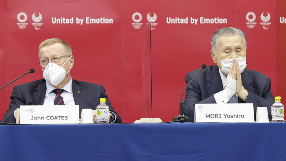 John Coates and Mori Yoshiro, pictured here speaking to the media.