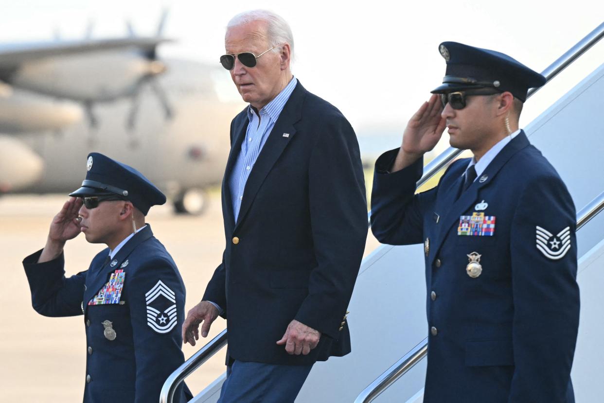 US President Joe Biden disembarks from Air Force One upon arrival at Delaware Air National Guard Base in New Castle, Delaware, July 5, 2024.