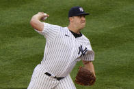 New York Yankees starting pitcher Jameson Taillon winds up during the first inning of a baseball game against the Atlanta Braves, Tuesday, April 20, 2021, at Yankee Stadium in New York. (AP Photo/Kathy Willens)