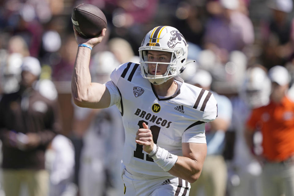 CORRECTS SCORE - Western Michigan quarterback Hayden Wolff (11) passes against Mississippi State during second half of an NCAA college football game, Saturday, Oct. 7, 2023, in Starkville, Miss. Mississippi State won 41-28. (AP Photo/Rogelio V. Solis)