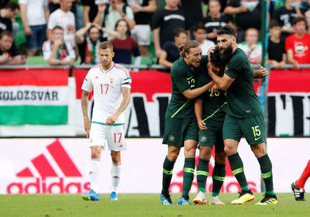 Soccer Football - International Friendly - Hungary vs Australia - Groupama Arena, Budapest, Hungary - June 9, 2018 Australia's Daniel Arzani celebrates with team mates after scoring their first goal REUTERS/Bernadett Szabo