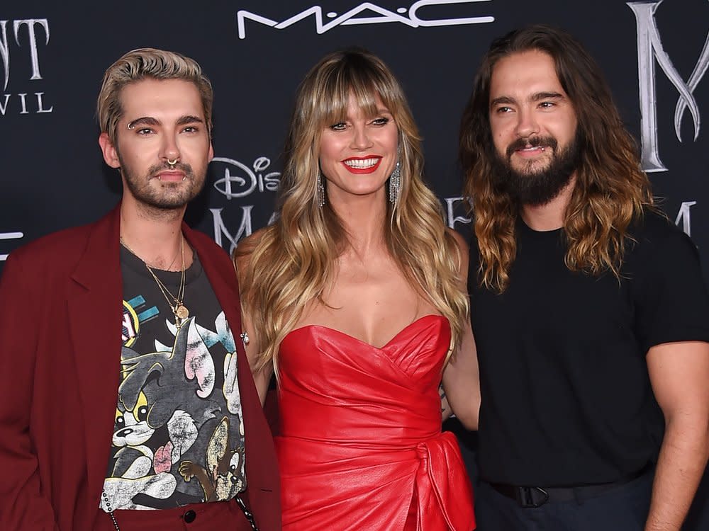 Heidi Klum mit den Kaulitz-Zwillingen auf dem roten Teppich. (Bild: DFree/Shutterstock.com)