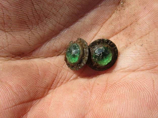 Archaeologists at the Mackinac State Historic Parks Colonial Michilimackinac excavation site recently uncovered a set of joined buttons, similar to modern day cufflinks, on Wednesday.