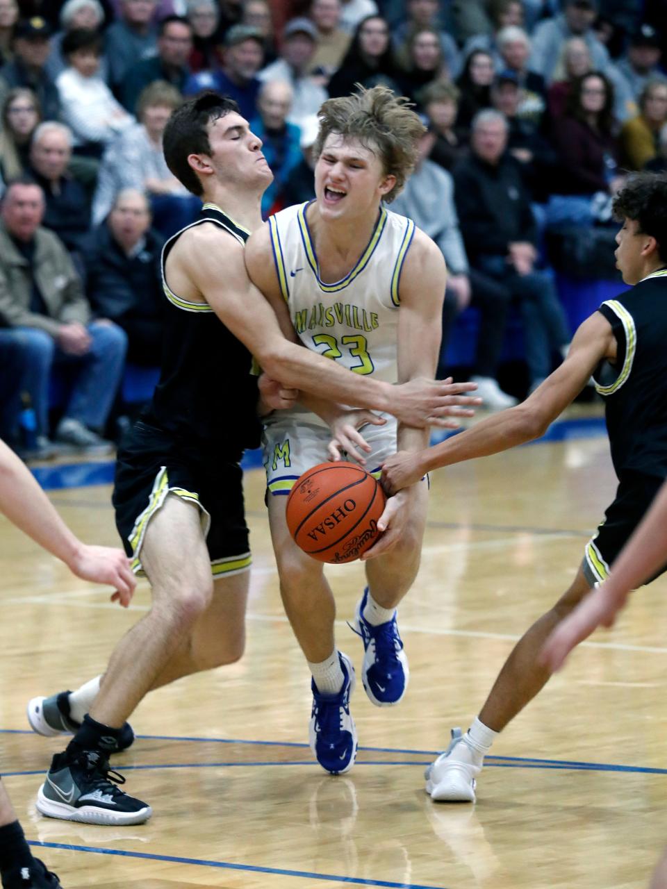 Hayden Jarrett, of Maysville, tries to drive past Tri-Valley's Aaron Frueh during the Panthers' 57-46 win on Friday night in Newton Township. Jarrett scored a game-high 20 points to lead three Maysville players in double figures as they remained unbeaten and alone atop the Muskingum Valley League's Big School Division.