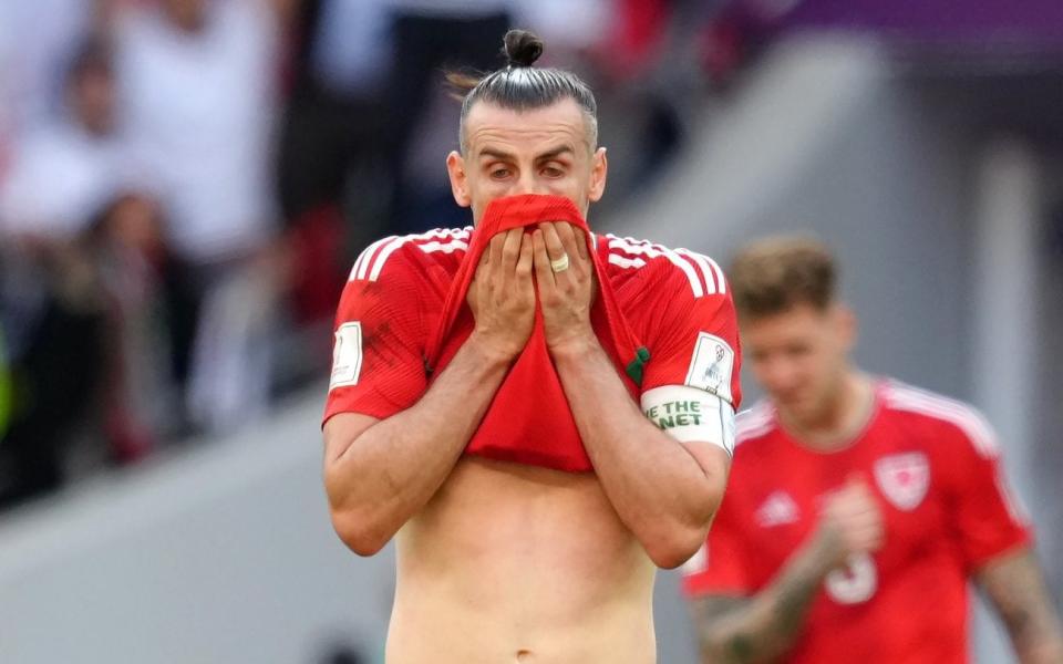 Wales' Gareth Bale looks dejected after the FIFA World Cup Group B match at the Ahmad Bin Ali Stadium - 'It's gutting, we're gutted': How Iran turned Wales' 64-year World Cup dream into a nightmare - PA/Nick Potts 