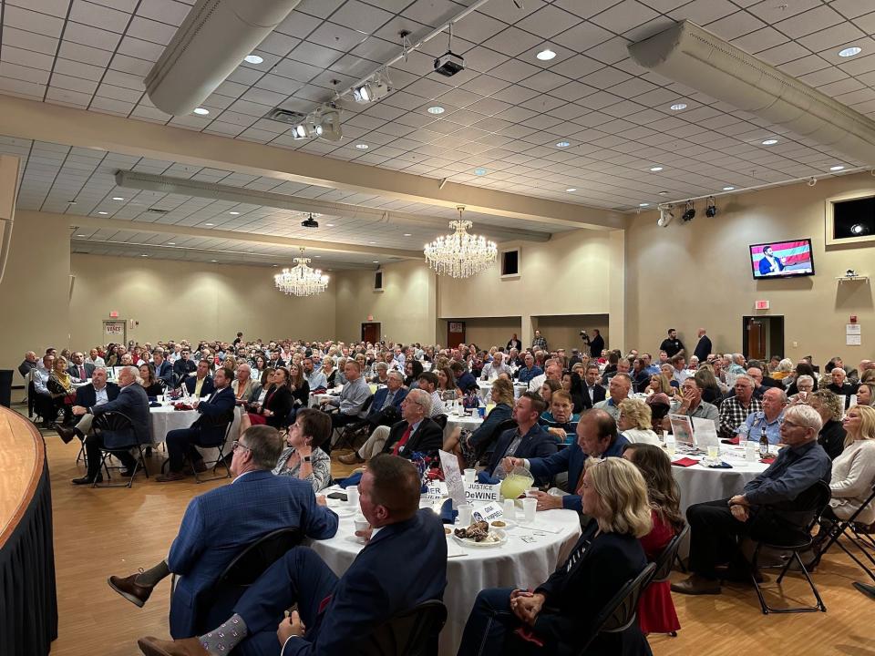 Attendees listen as Republican Senate candidate JD Vance speaks at the Republican dinner in Lima, Ohio.