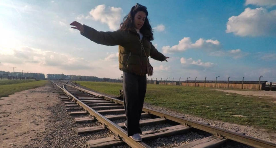 The Auschwitz Memorial which sits on the site of a former Nazi death camp has asked visitors to stop taking photos walking on train tracks. Source: Twitter/ Auschwitz Memorial