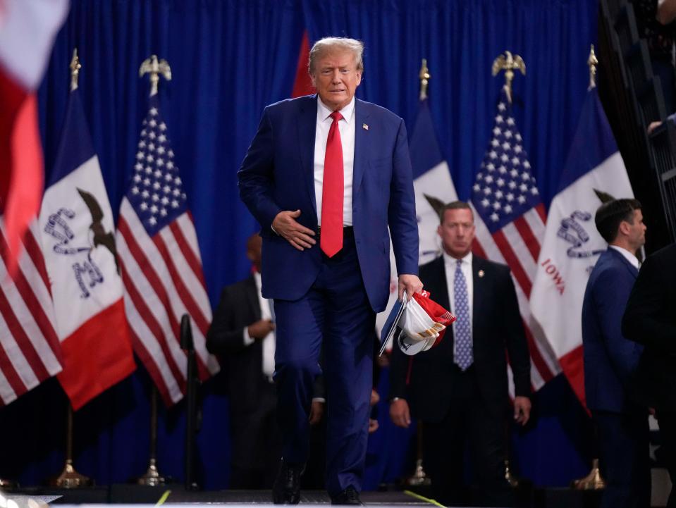 Republican presidential candidate and former President Donald Trump appears during a rally, Saturday, Nov. 18, 2023, in Fort Dodge, Iowa. (AP Photo/Bryon Houlgrave)