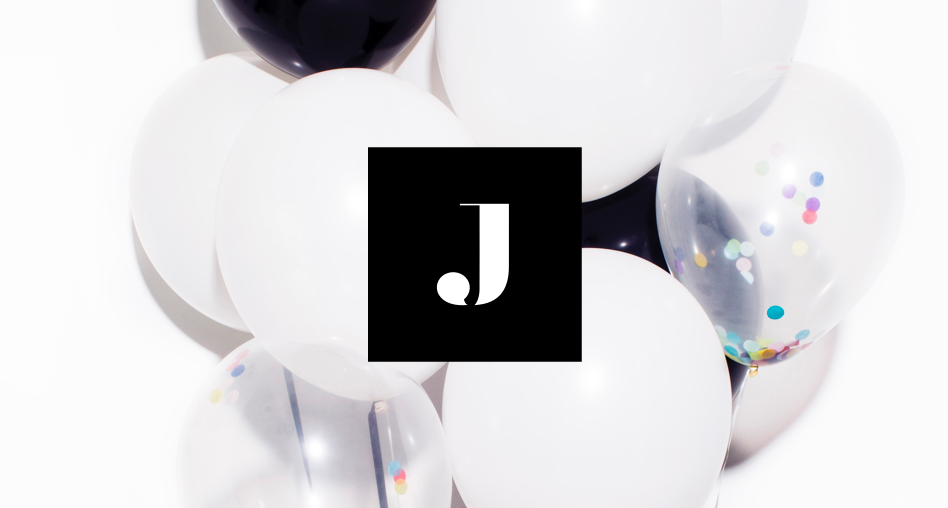 The Jetblack "J" logo in front of some balloons.