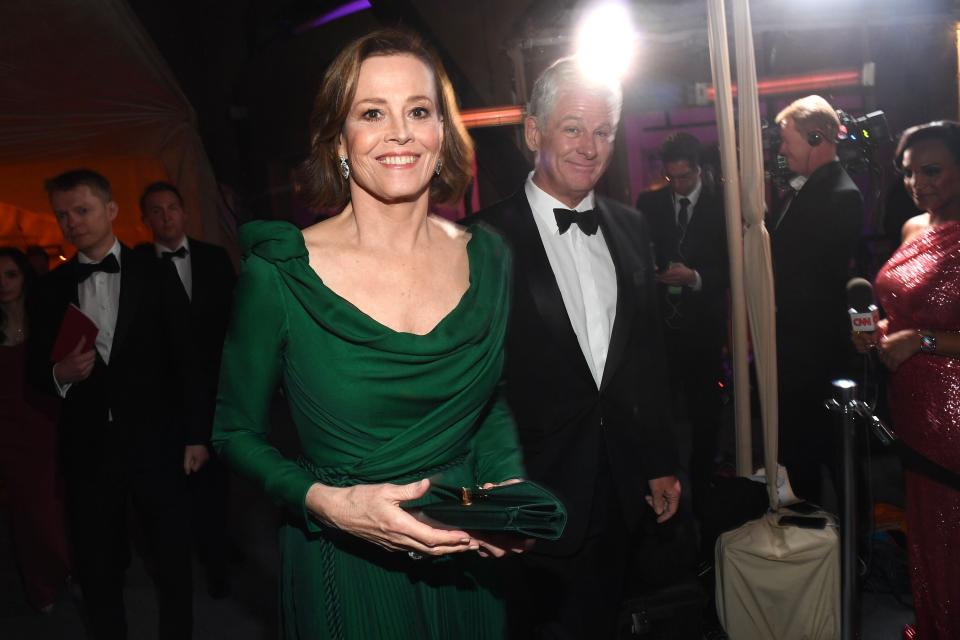 Sigourney Weaver and Jim Simpson had date night at the Governor's Ball after the Academy Awards. 