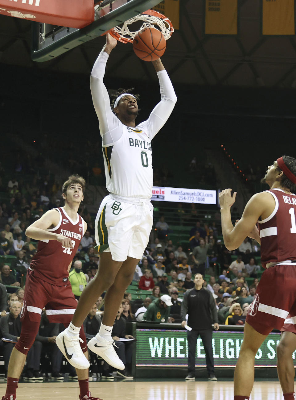 Baylor forward Flo Thamba dunks the ball against Stanford in the second half of an NCAA college basketball game, Saturday, Nov. 20, 2021, in Waco, Texas. (AP Photo/Jerry Larson)